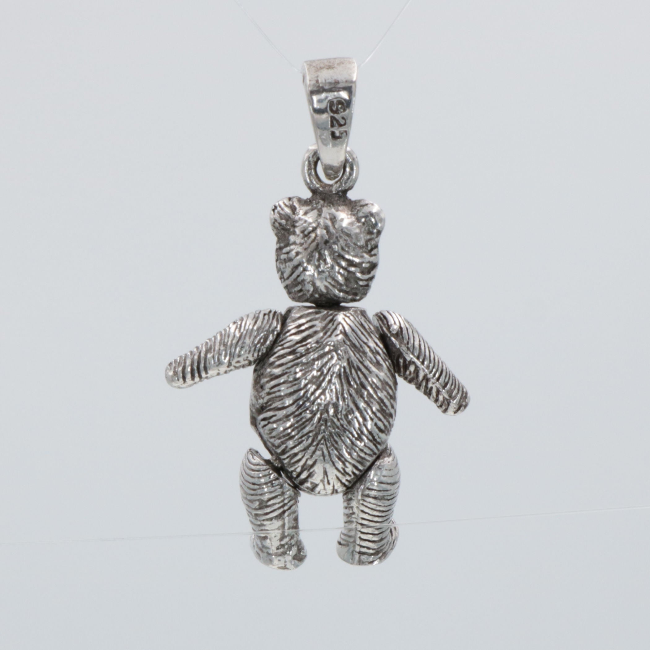 Back view of Teddy Bear Pendant Charm Movable Head, Arms & Legs - Large showing 925 sterling silver hallmark and spring ring 