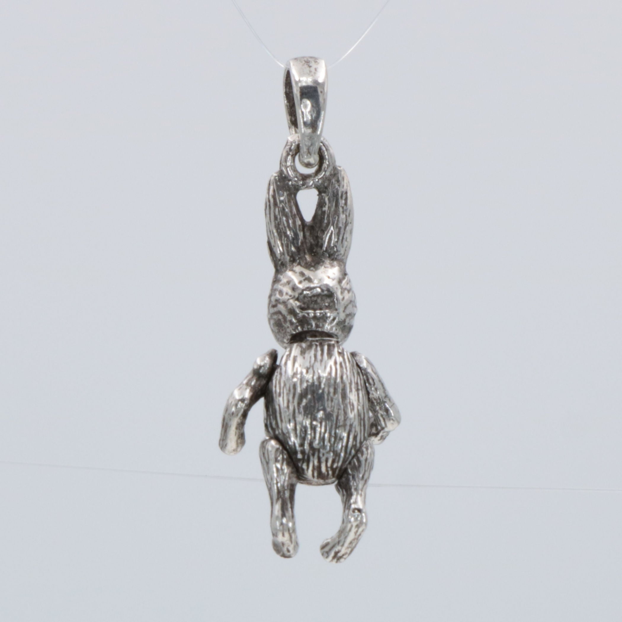 Back view of Moveable Rabbit Pendant Charm Arms, Legs & Head move in pure Sterling Silver showing 925 sterling silver hallmar