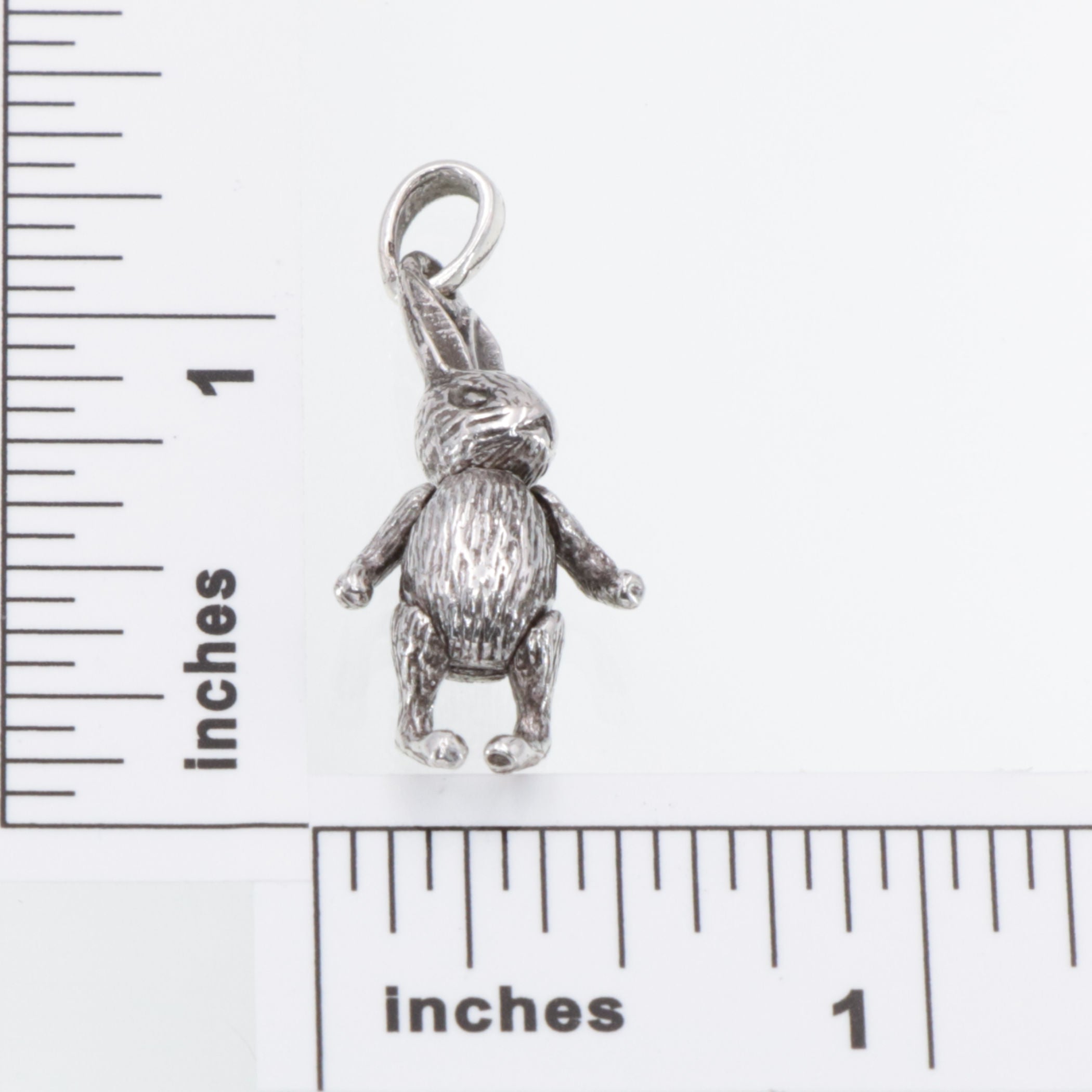 Detail view of Moveable Rabbit Pendant Charm Arms, Legs & Head move in pure Sterling Silver highlighting design details