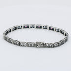 Back view of Victorian Style 3 Stone Natural Red Ruby Filigree Bracelet in Fine Sterling Silver showing 925 sterling silver h