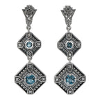 Art Deco two-tiered earrings, London blue topaz in filigree diamond frames, diamond accents, fan-shaped post, sterling silver