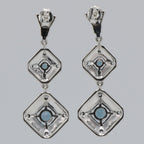 Back view of Art Deco Style London Blue Topaz Two Tiered Earrings showing 925 sterling silver hallmark and French wire hooks