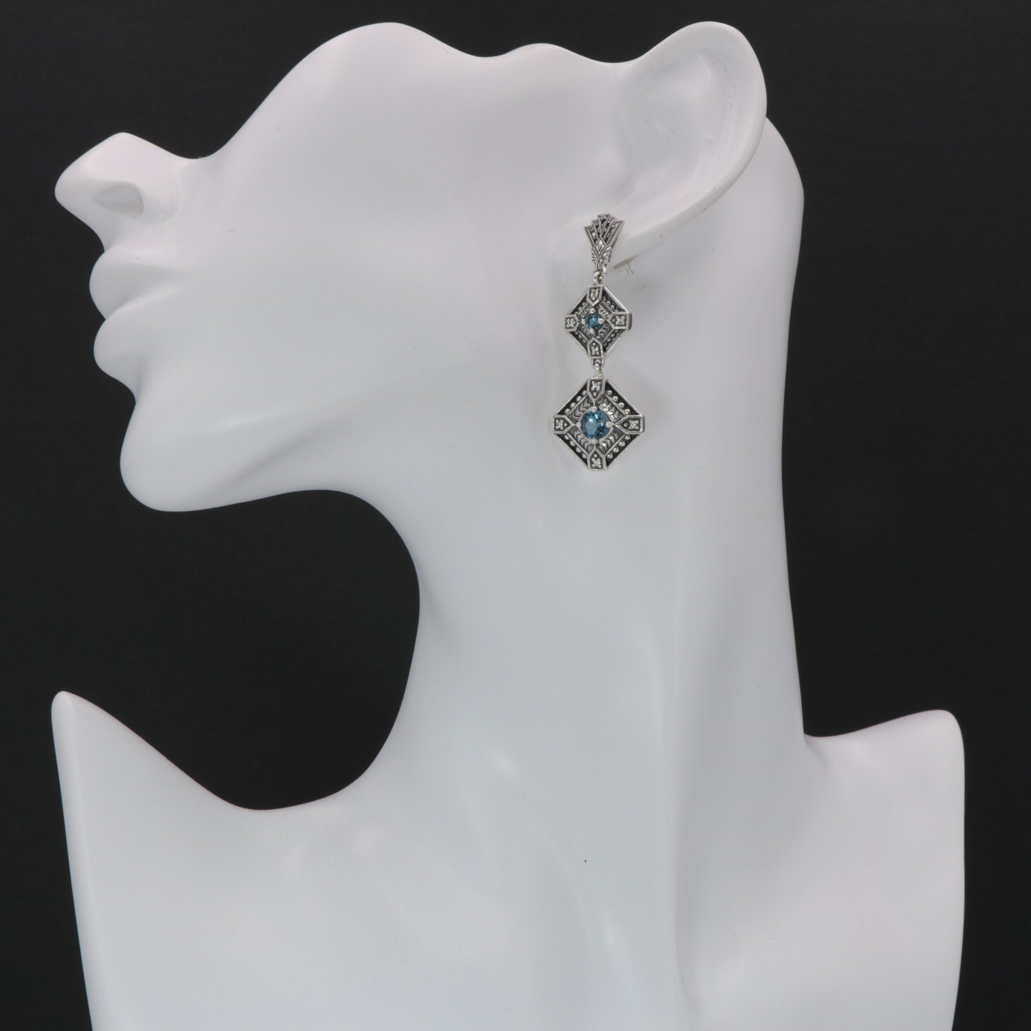 Detail view of Art Deco Style London Blue Topaz Two Tiered Earrings highlighting topaz detail