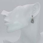 Detail view of Art Deco London Blue Topaz and White Topaz Filigree Earrings highlighting filigree detail
