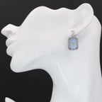 Detail view of Art Deco Style Filigree Earrings Blue Pressed Glass Crystal Diamond Accents highlighting filigree detail