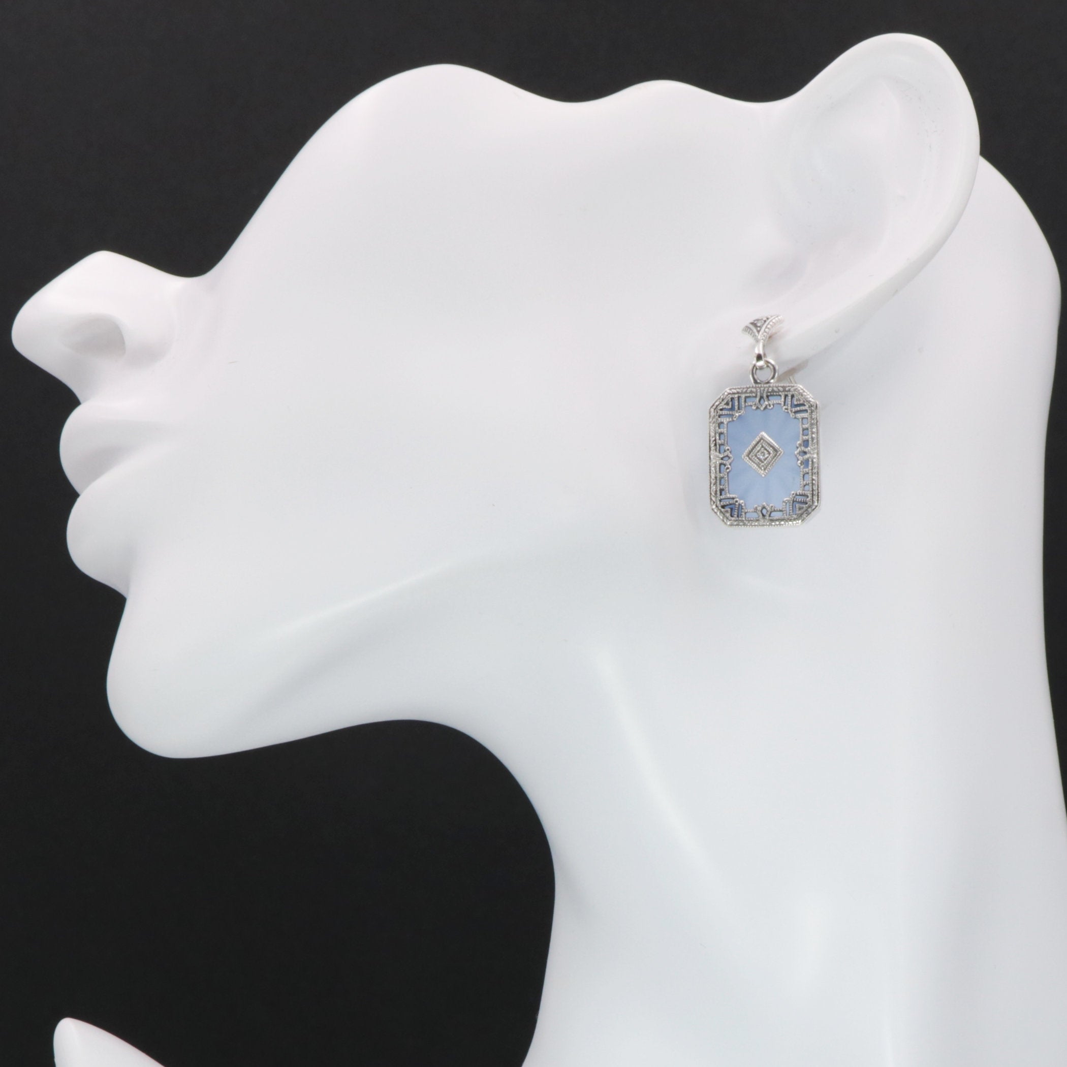 Detail view of Art Deco Style Filigree Earrings Blue Pressed Glass Crystal Diamond Accents highlighting filigree detail