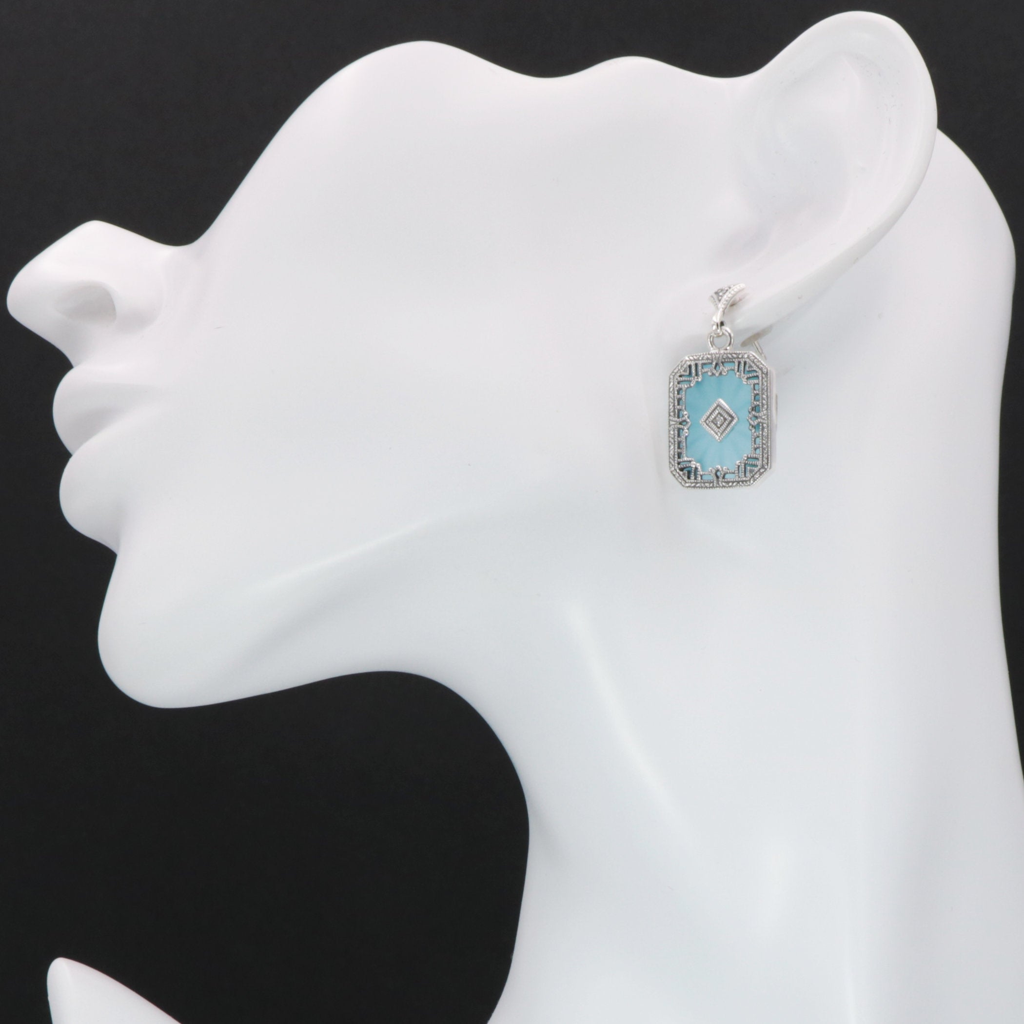 Detail view of Art Deco Style Filigree Earrings Teal Pressed Glass Crystal Diamond Accents highlighting filigree detail
