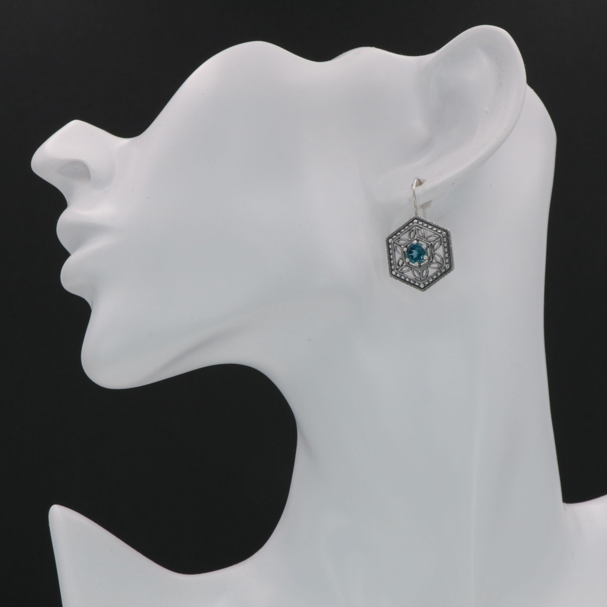 Detail view of Art Deco Style London Blue Topaz Filigree Earrings highlighting filigree detail