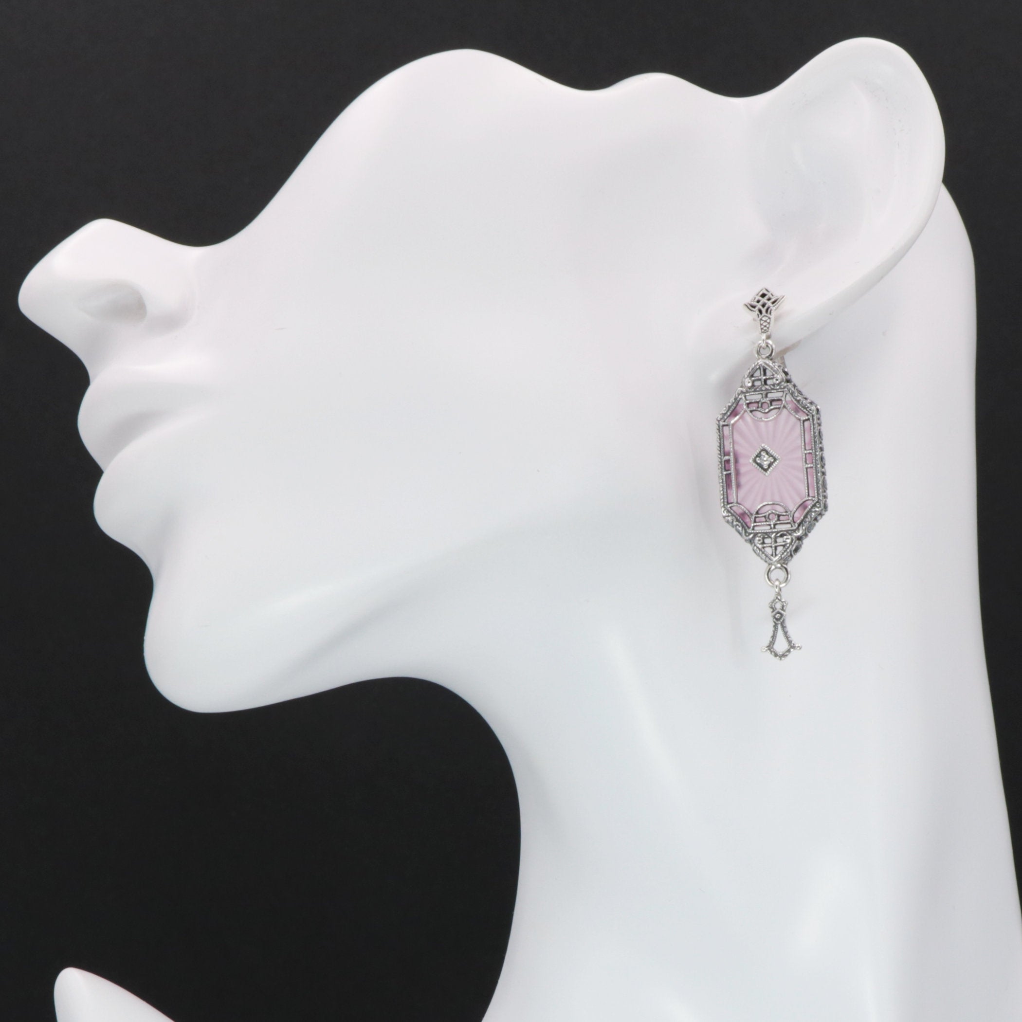 Detail view of Art Deco Style Pink Sunray Crystal Dangle Filigree Earrings Diamond Accent highlighting filigree detail