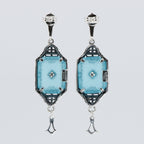 Back view of Art Deco Style Teal Sunray Crystal Dangle Filigree Earrings Diamond Accent showing 925 sterling silver hallmark and French wire hooks