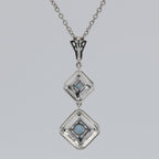 Back view of Art Deco Style Genuine London Blue Topaz and Filigree Necklace showing 925 sterling silver hallmark and spring r