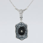 Back view of Art Deco Style Black Onyx and Diamond Pendant and Chain showing 925 sterling silver hallmark and spring ring cla