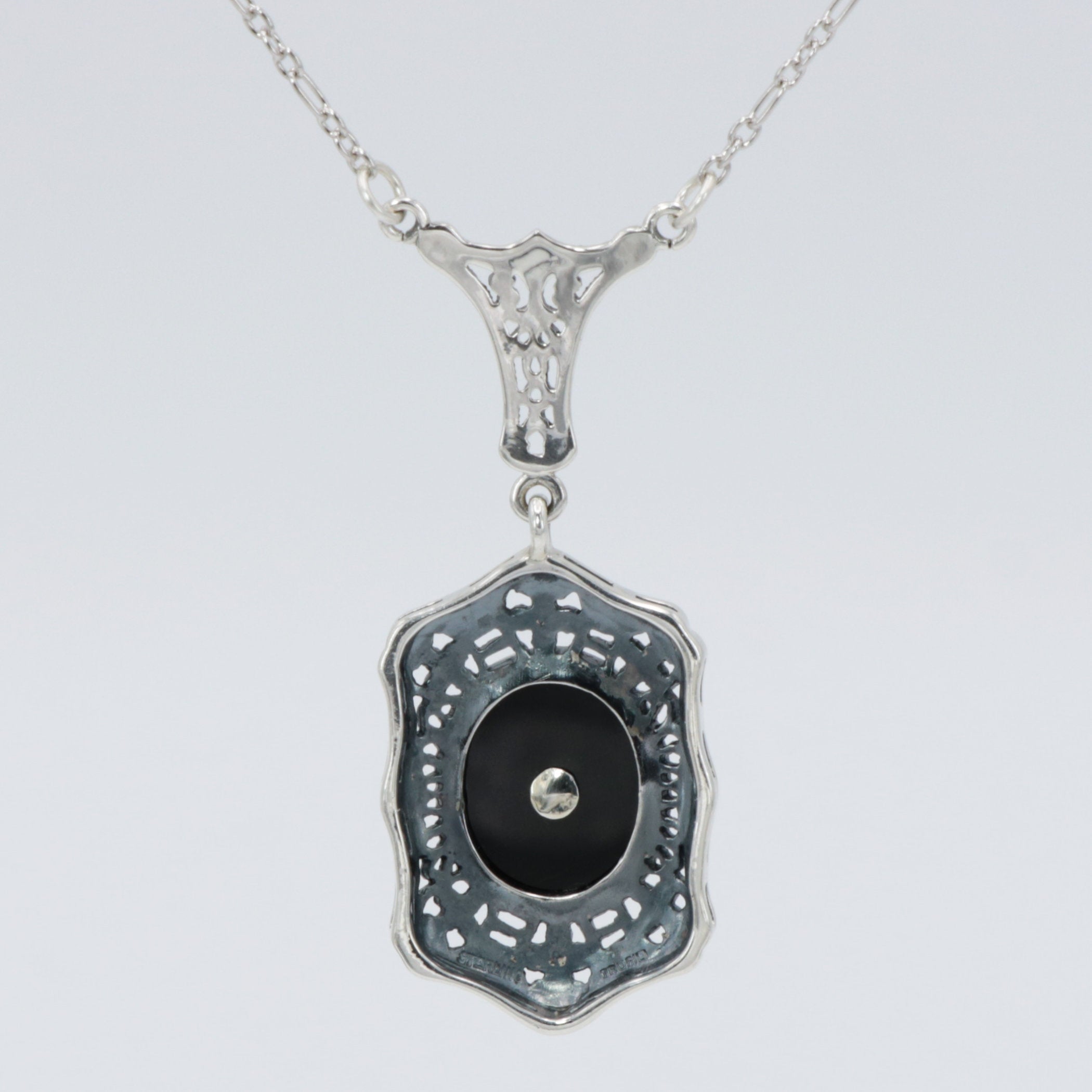 Back view of Art Deco Style Black Onyx and Diamond Pendant and Chain showing 925 sterling silver hallmark and spring ring cla