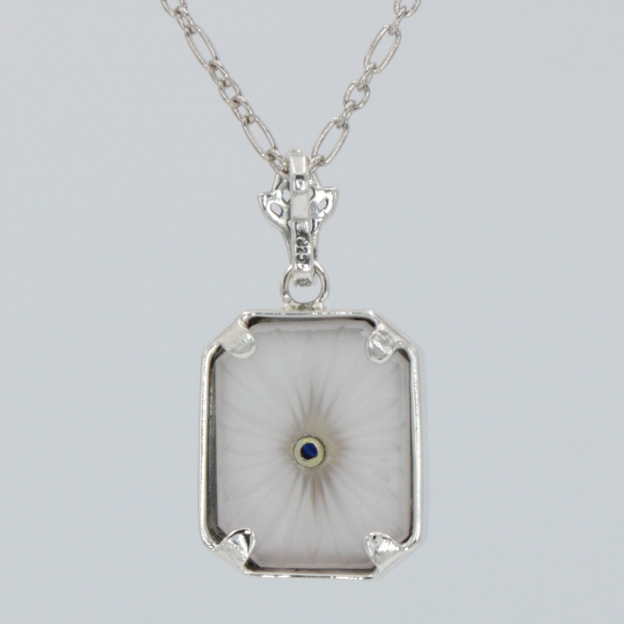 Back view of Antique Style Camphor Glass Pendant with Blue Sapphire Center Sterling Silver showing 925 sterling silver hallma