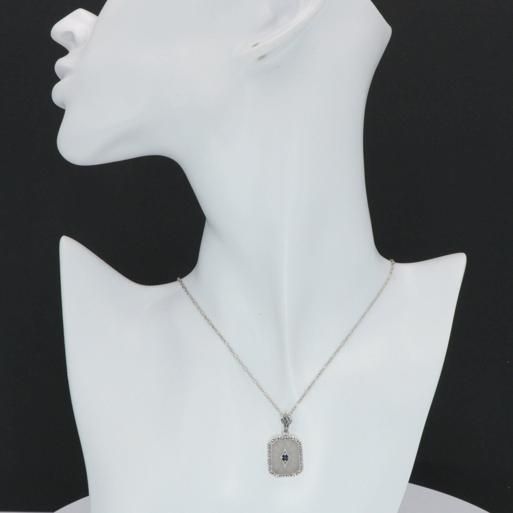 Detail view of Antique Style Camphor Glass Pendant with Blue Sapphire Center Sterling Silver highlighting Sapphire, Camphor G