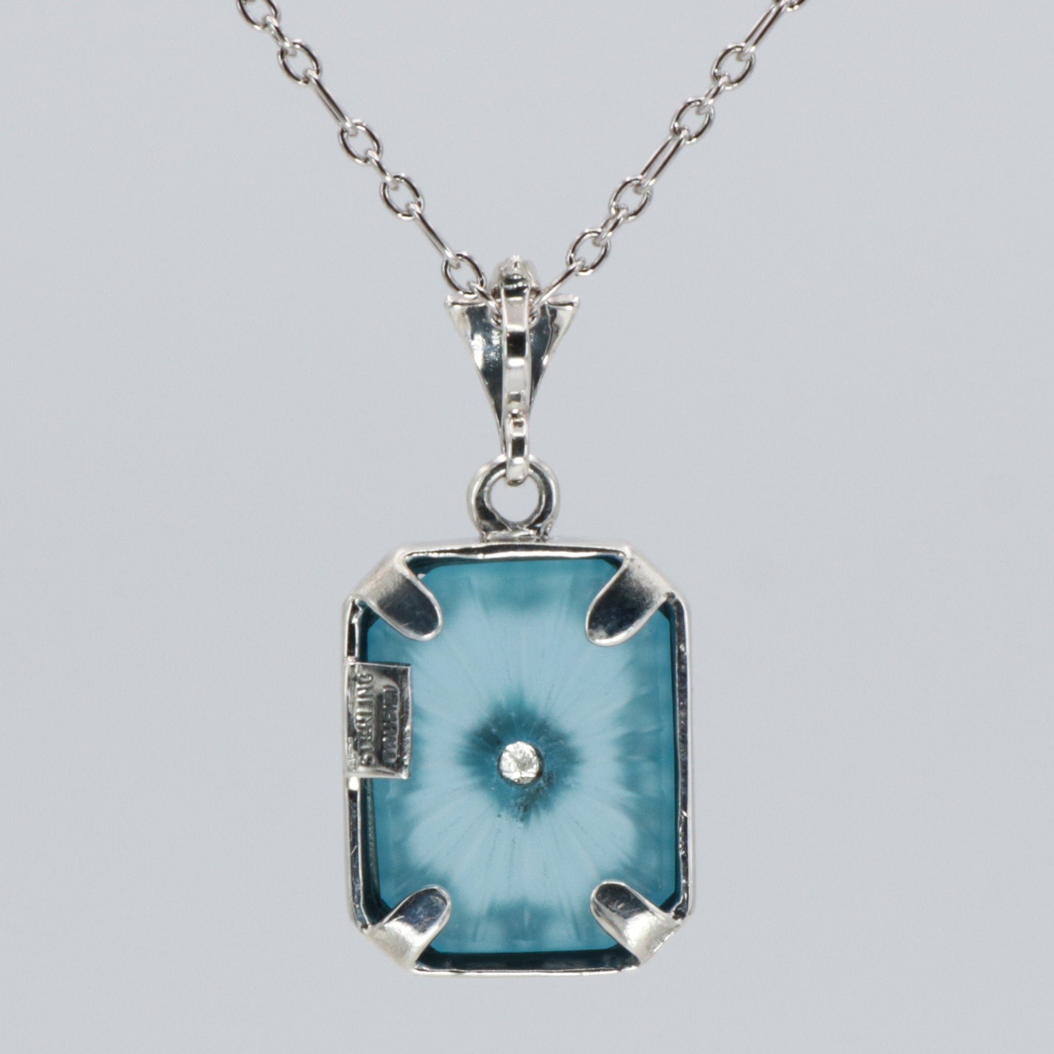 Back view of Art Deco Style Filigree Pendant Teal Pressed Glass Crystal Diamond Accents Sterling Silver showing 925 sterling 
