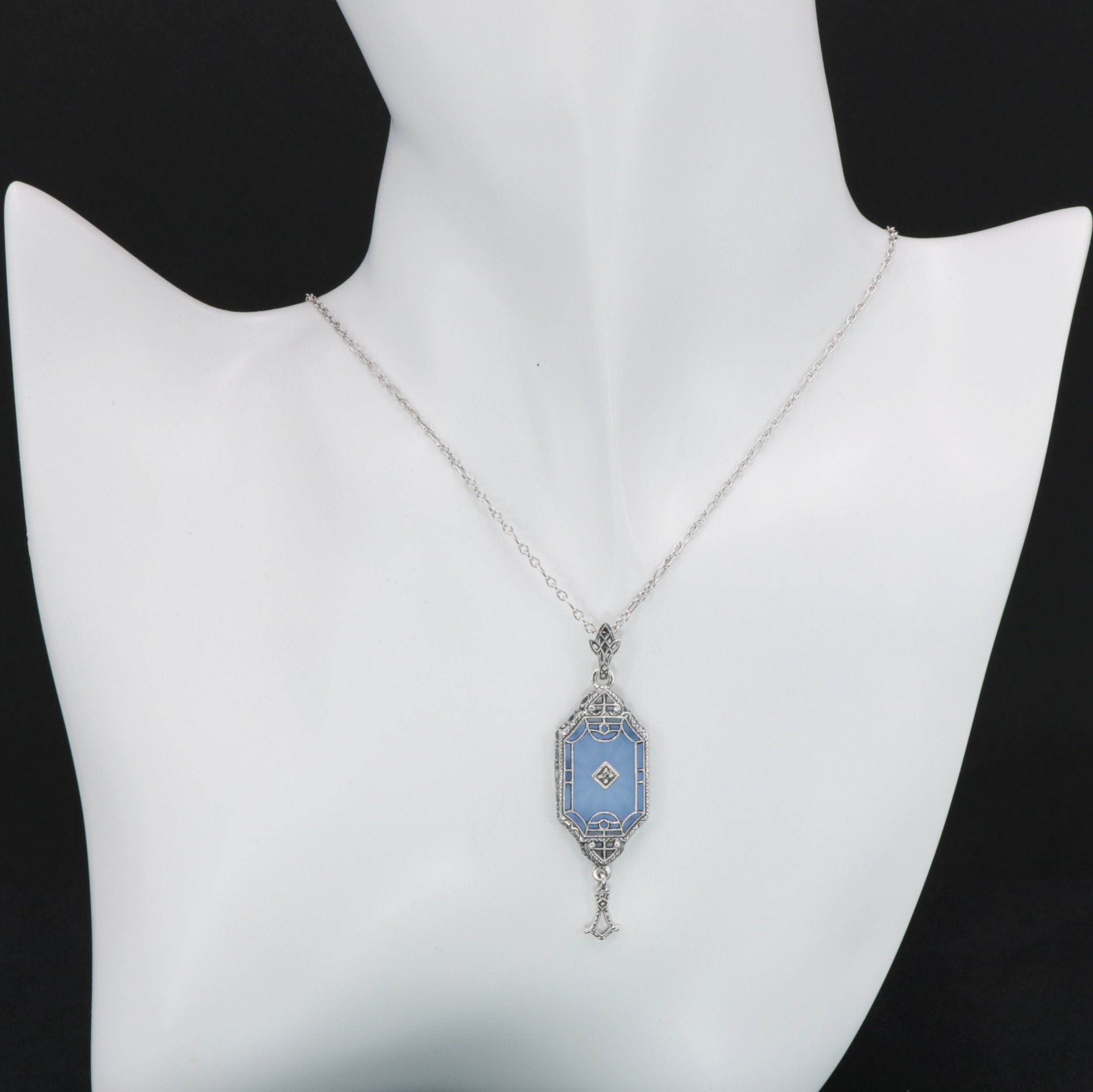 Detail view of Art Deco Style Blue Sunray Crystal Dangle Filigree Pendant Diamond Accent Sterling Silver highlighting Diamond