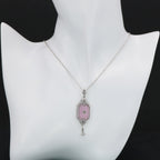 Detail view of Art Deco Style Pink Sunray Crystal Dangle Filigree Pendant Diamond Accent Sterling Silver highlighting Diamond