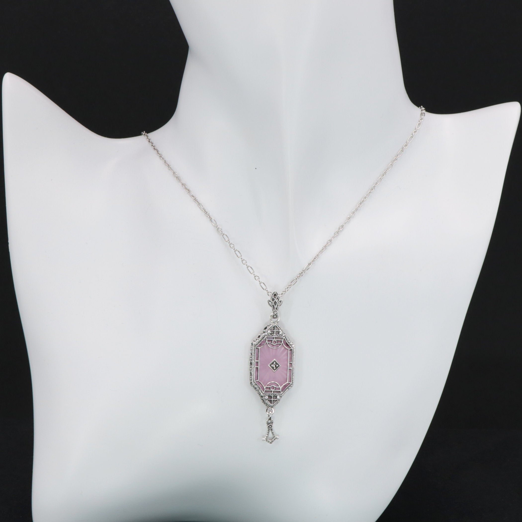 Detail view of Art Deco Style Pink Sunray Crystal Dangle Filigree Pendant Diamond Accent Sterling Silver highlighting Diamond