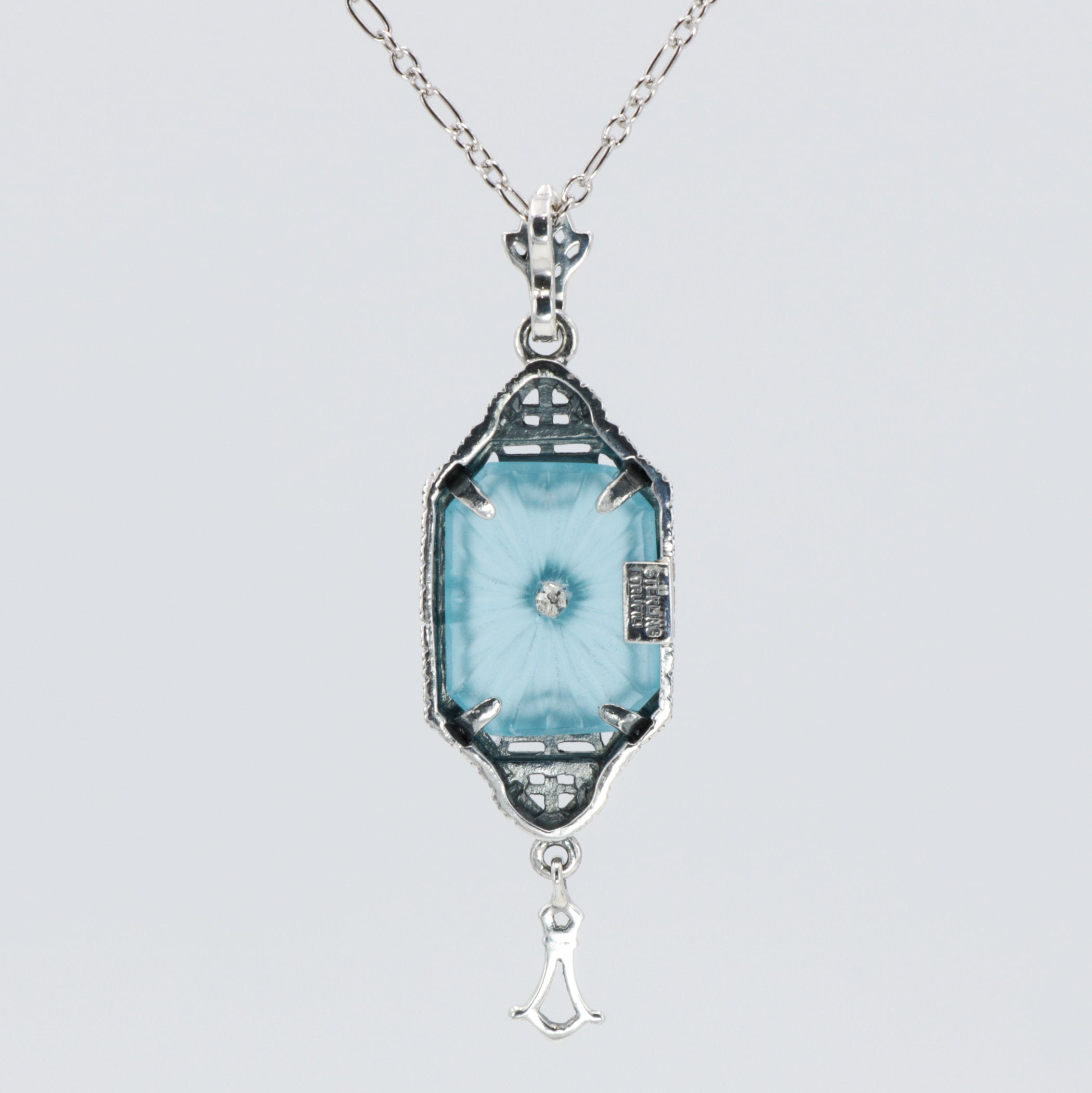 Back view of Art Deco Style Teal Sunray Crystal Dangle Filigree Pendant Diamond Accent Sterling Silver showing 925 sterling s