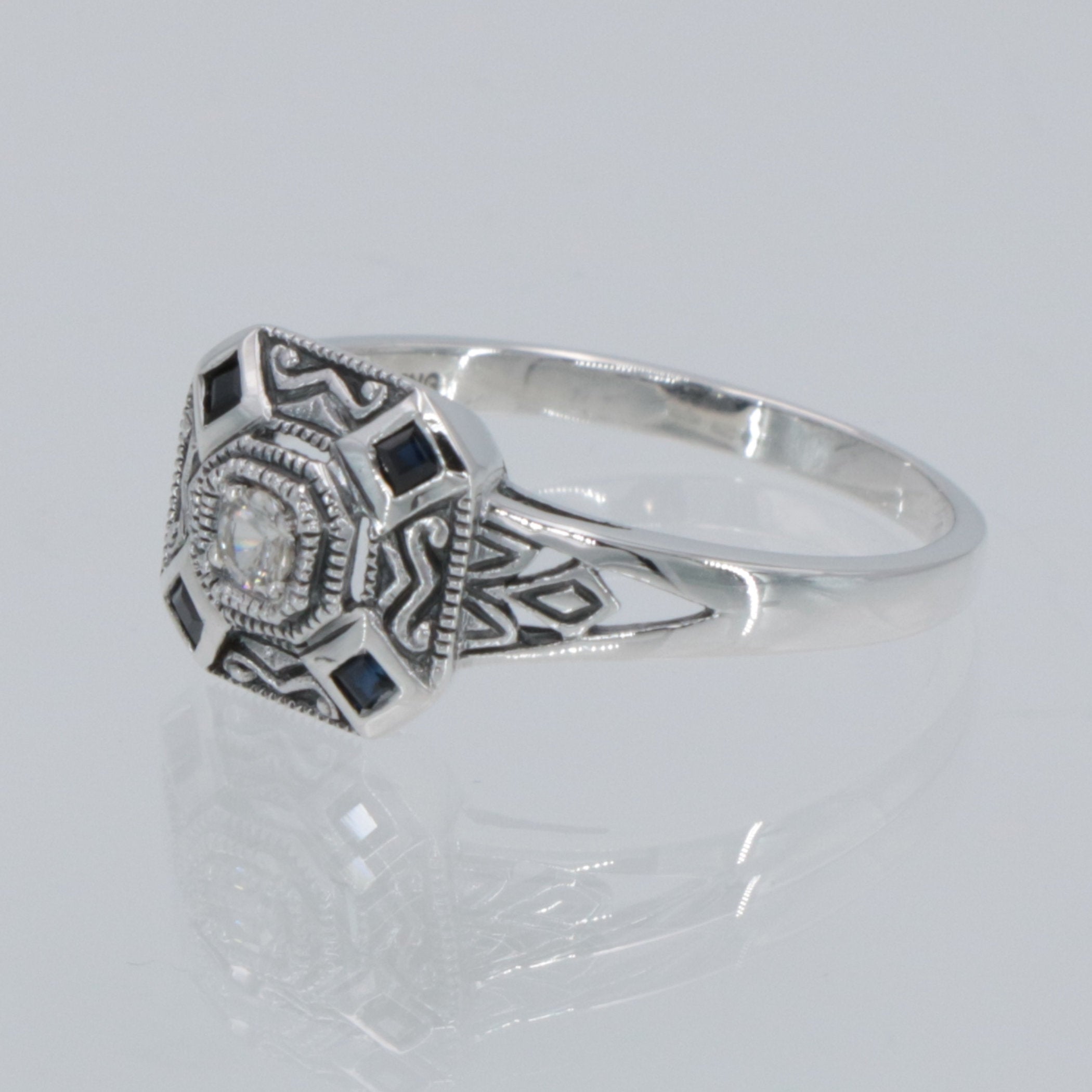 Detail view of White and Blue Sapphire Filigree Ring - Deco Style highlighting Sapphire