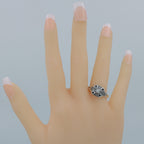 Detail view of White and Blue Sapphire Filigree Ring - Deco Style highlighting Sapphire
