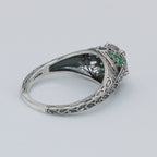 Detail view of Art Deco Style White Topaz Filigree Ring Green Emerald Accents Sterling Silver highlighting White Topaz, Emera