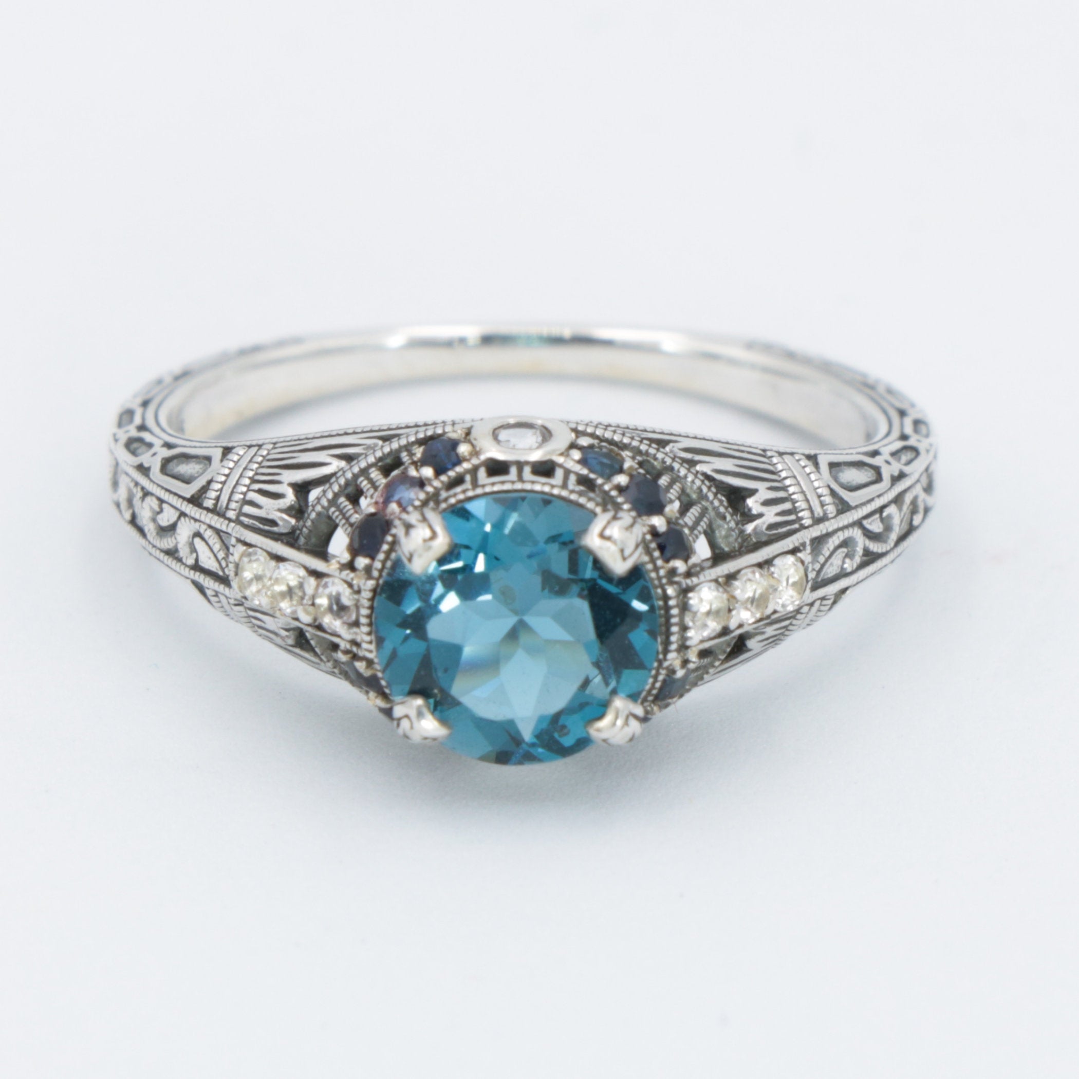 Back view of Art Deco Style 7mm London Blue Topaz Filigree Ring w/ Sapphire and Topaz accents Sterling Silver showing 925 ste