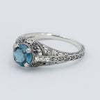 Detail view of Art Deco Style 7mm London Blue Topaz Filigree Ring w/ Sapphire and Topaz accents Sterling Silver highlighting 