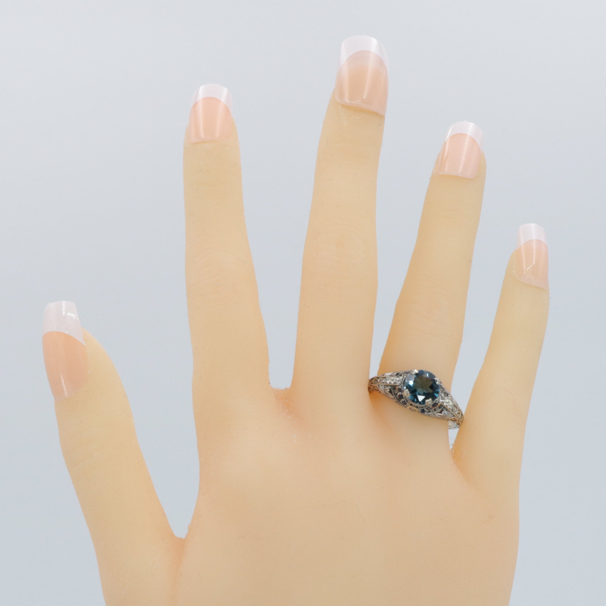 Detail view of Art Deco Style 7mm London Blue Topaz Filigree Ring w/ Sapphire and Topaz accents Sterling Silver highlighting 