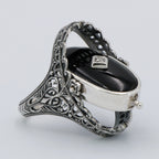 Detail view of Victorian Style Lapis Diamond and Onyx Filigree Flip Ring Sterling Silver highlighting Diamond, Lapis