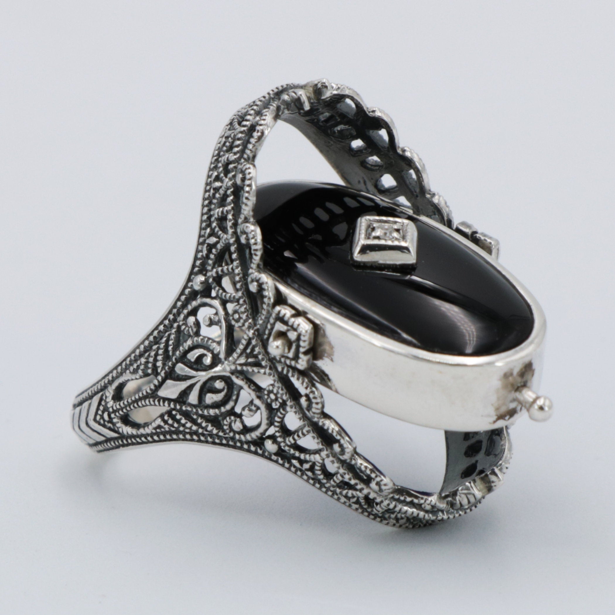 Detail view of Victorian Style Lapis Diamond and Onyx Filigree Flip Ring Sterling Silver highlighting Diamond, Lapis