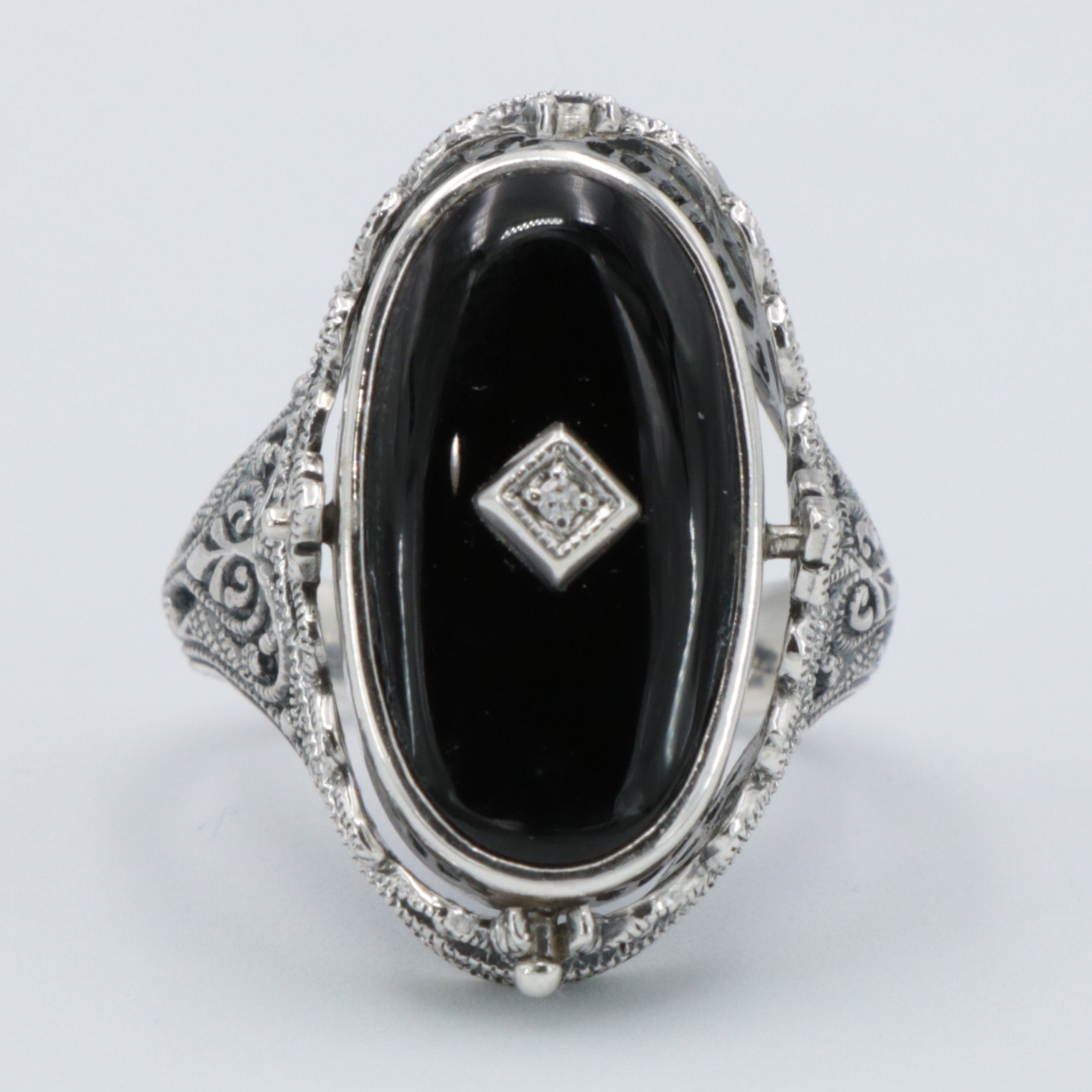 Detail view of Victorian Style Lapis Diamond and Onyx Filigree Flip Ring Sterling Silver highlighting Diamond, Lapis