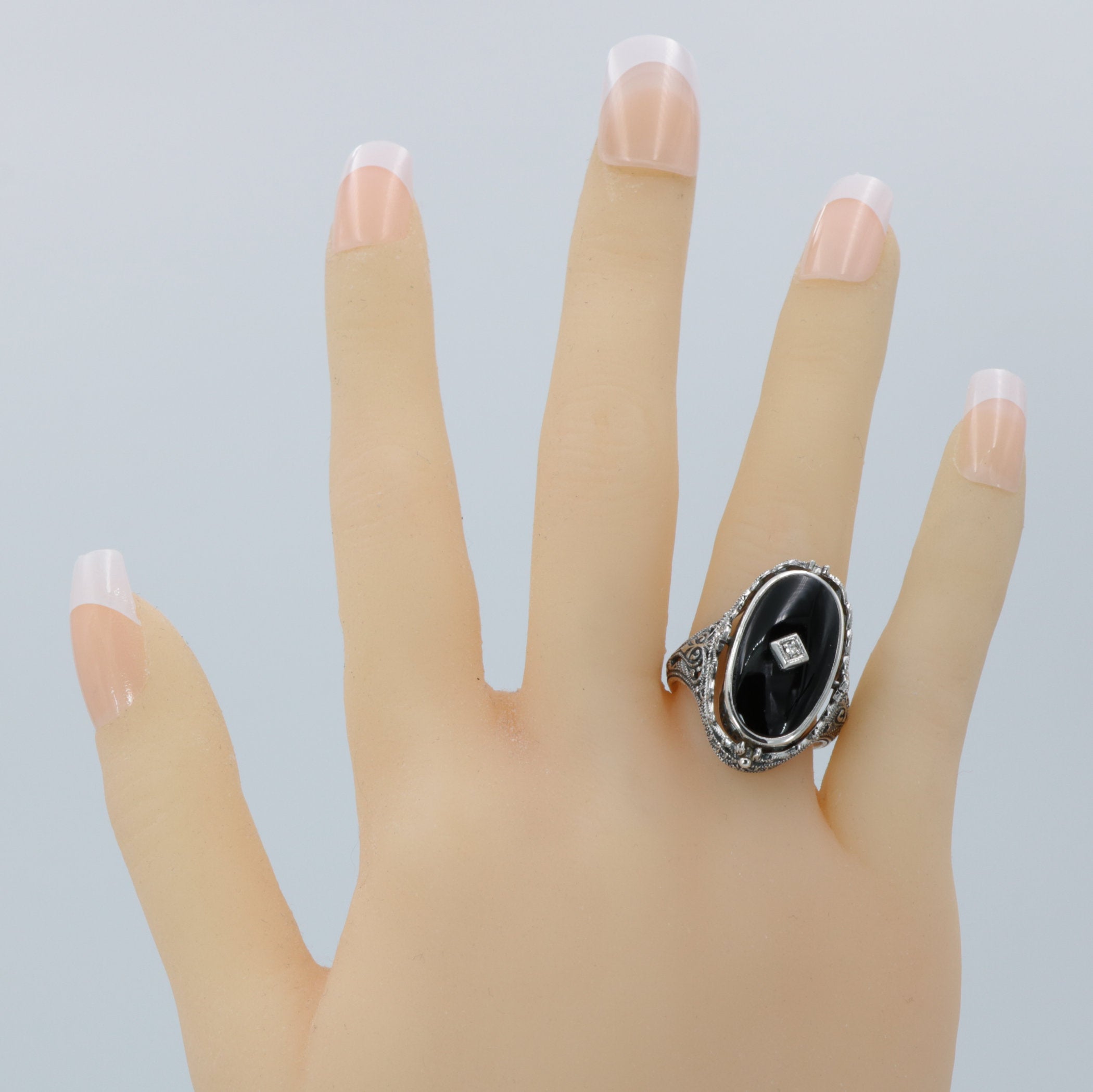 Detail view of Victorian Style Lapis Diamond and Onyx Filigree Flip Ring Sterling Silver highlighting Diamond, Lapis