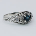 Detail view of Art Deco Style Filigree London Blue Topaz and White Topaz Ring Sterling Silver highlighting Blue Topaz, London