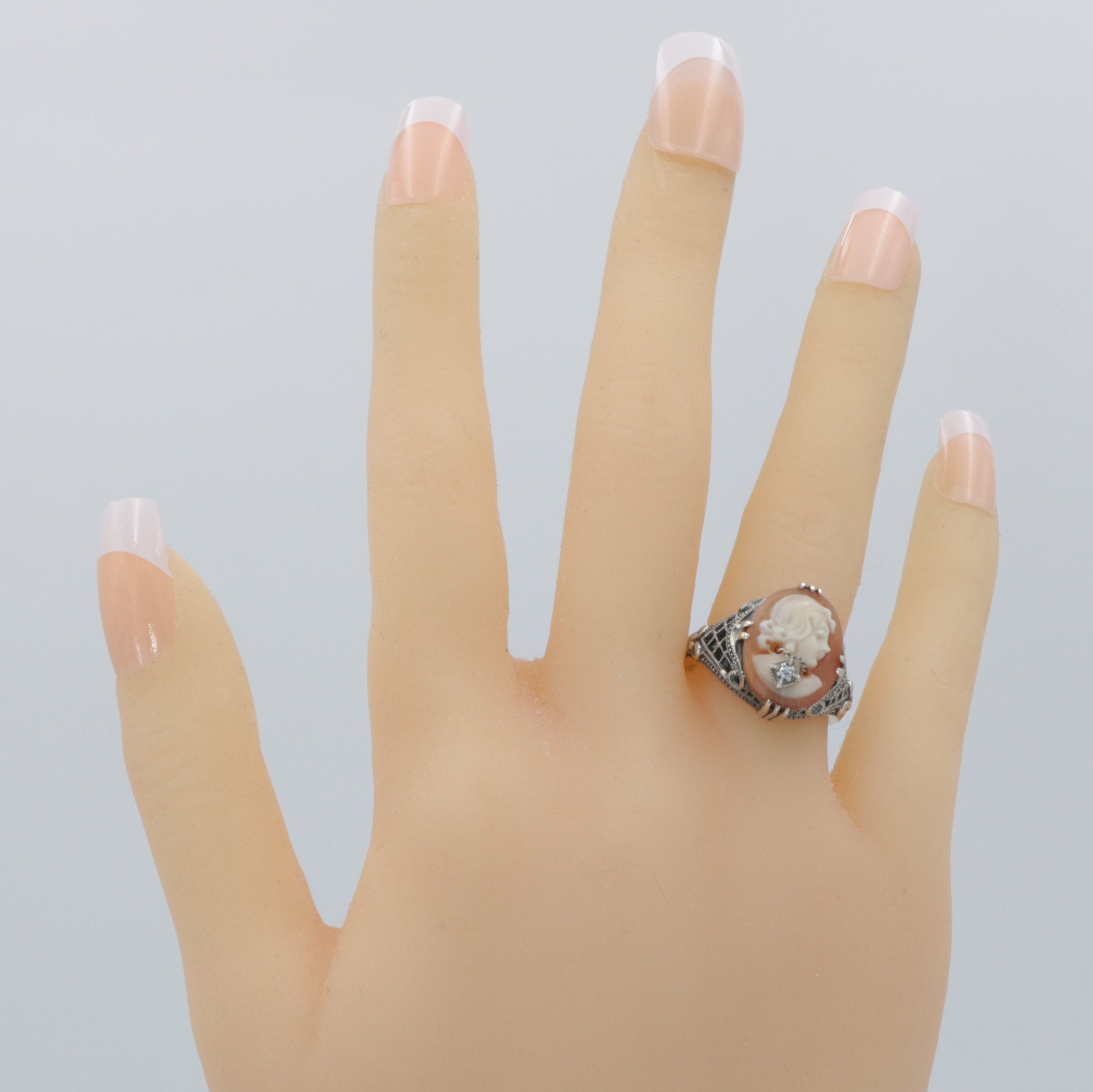 Detail view of Hand Carved Italian Shell Cameo w/ Diamond Necklace Ring highlighting Diamond