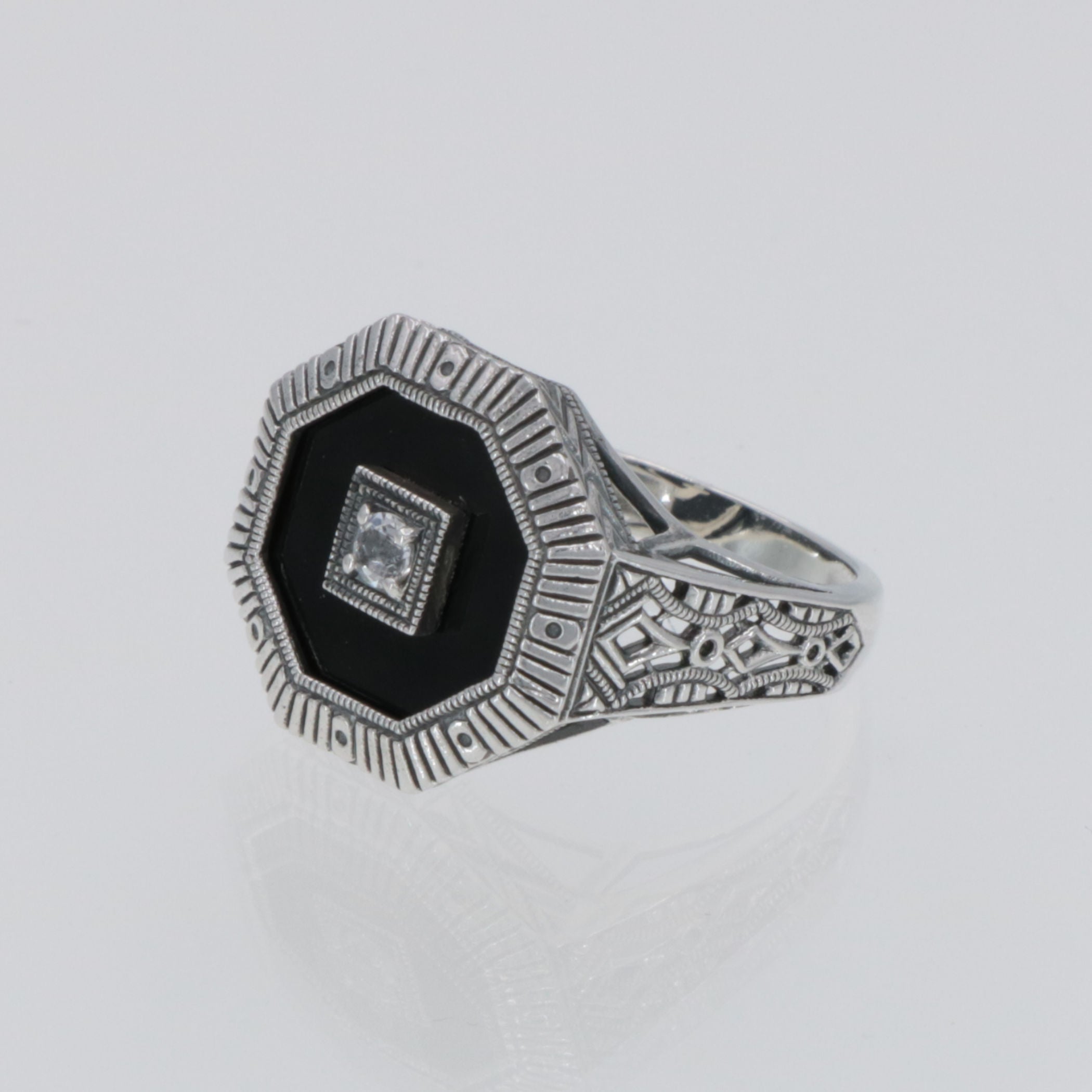 Detail view of Art Deco Style Octagon Shape Black Oynx Ring with White Topaz Center highlighting White Topaz