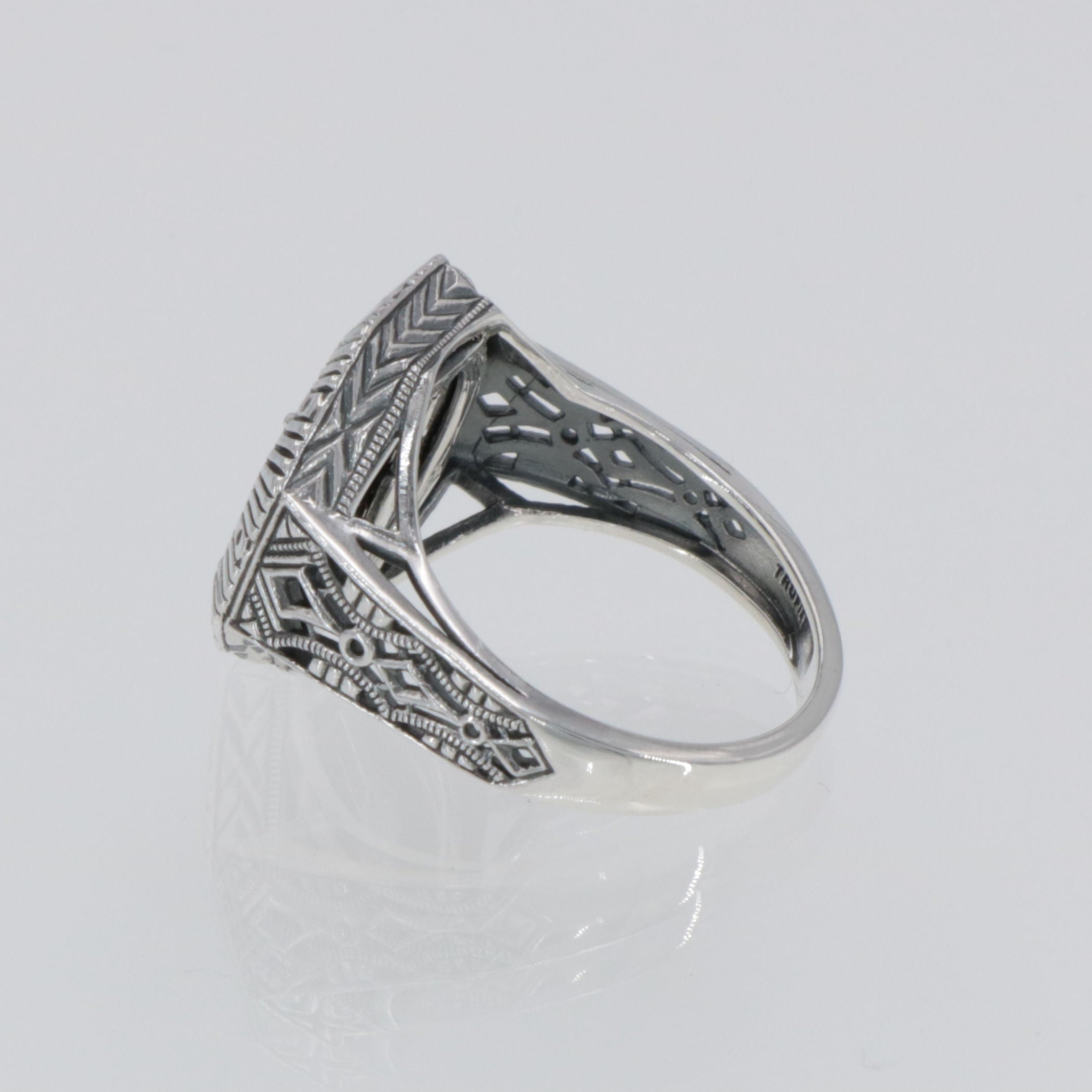 Detail view of Art Deco Style Octagon Shape Black Oynx Ring with White Topaz Center highlighting White Topaz