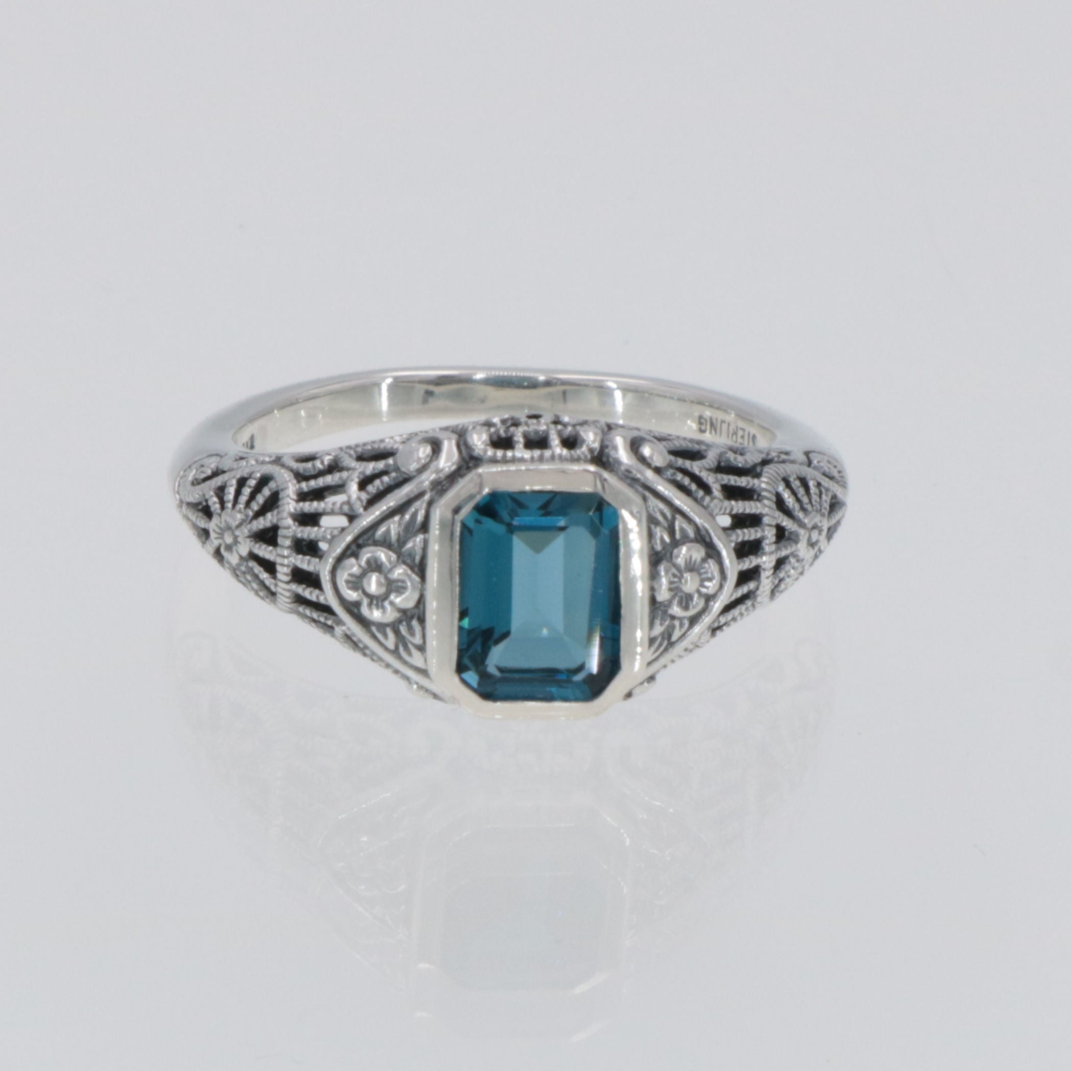 Back view of Victorian Style London Blue Topaz Filigree Ring Floral Design Sterling Silver showing 925 sterling silver hallma