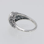 Detail view of Victorian Style London Blue Topaz Filigree Ring Floral Design Sterling Silver highlighting Blue Topaz, London 