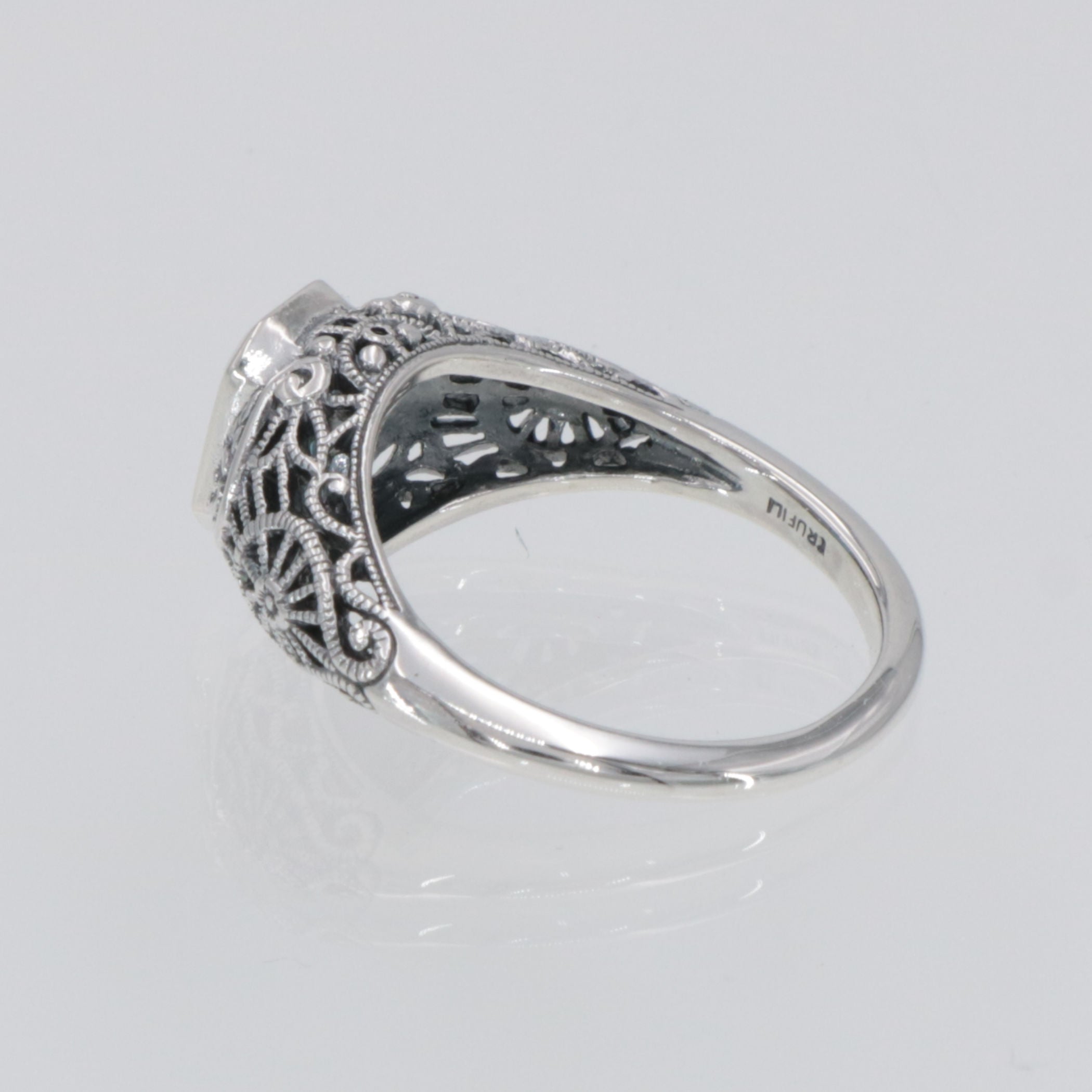 Detail view of Victorian Style London Blue Topaz Filigree Ring Floral Design Sterling Silver highlighting Blue Topaz, London 