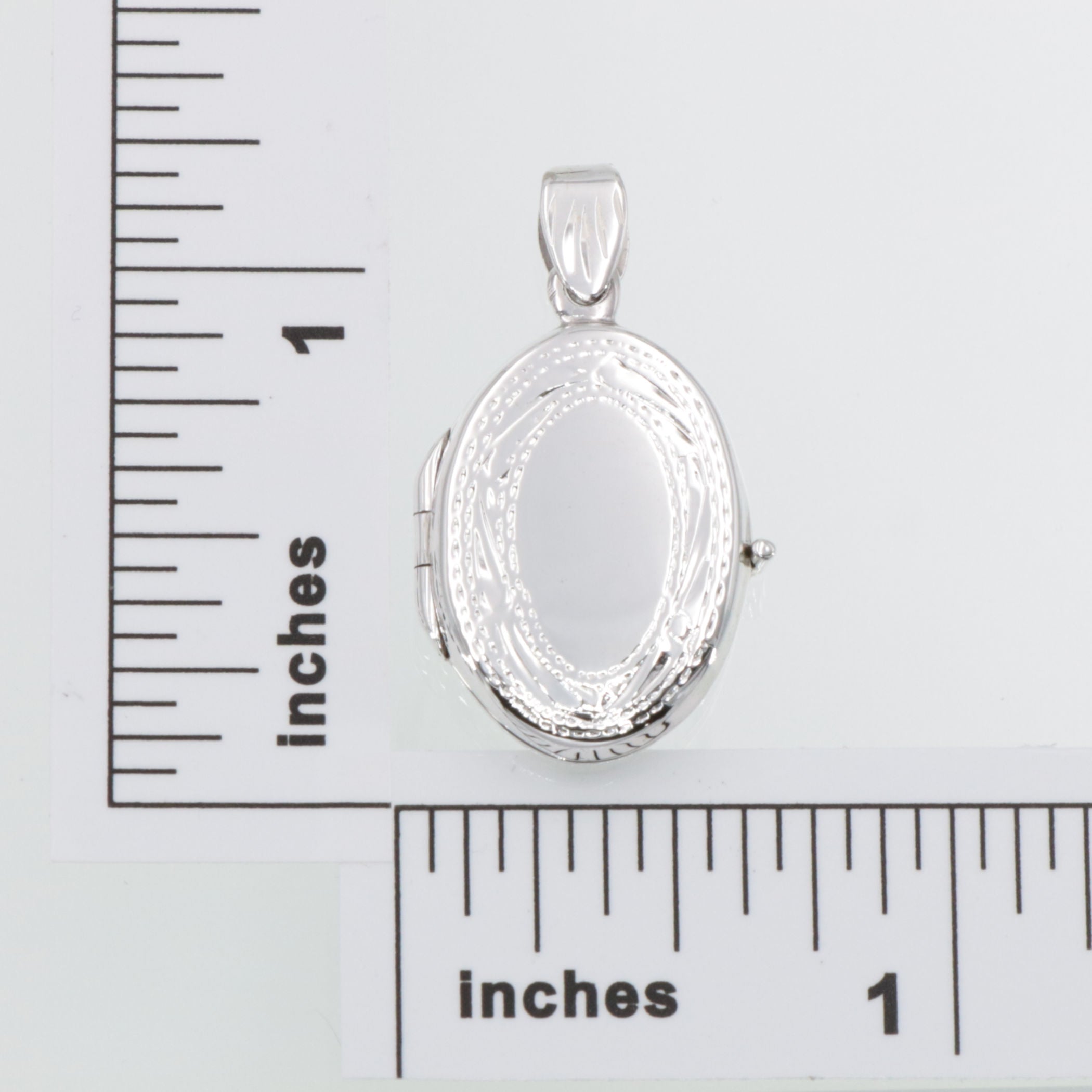 Detail view of Etched Border Design Oval Locket - Engravable highlighting design details