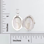 Detail view of Etched Border Design Oval Locket - Engravable highlighting design details