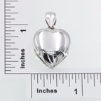 Detail view of 4 Photo Clover Heart Locket - Small highlighting design details