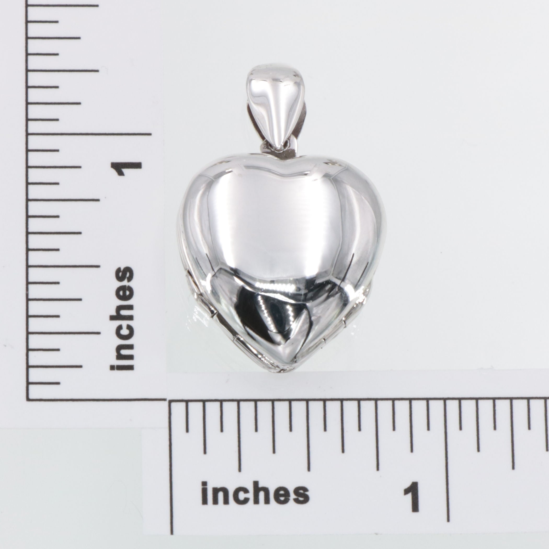 Detail view of 4 Photo Clover Heart Locket - Small highlighting design details