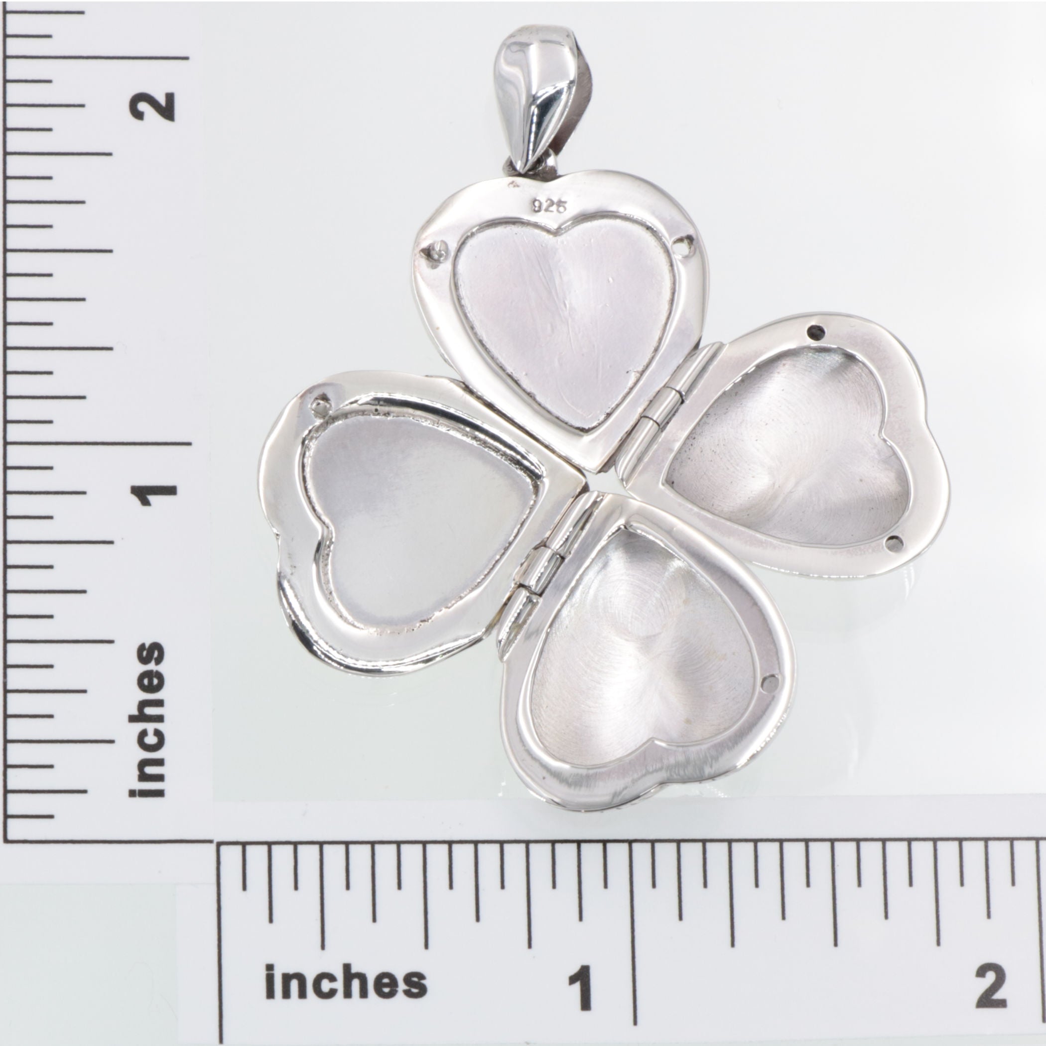 Detail view of 4 Photo Clover Heart Locket - Small highlighting design details