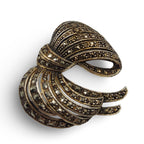 Back view of Fine Bead Set Marcasite Art Nouveau Style Swirly Bow Pin or Brooch showing 925 sterling silver hallmark and pin 