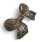 Back view of Fine Bead Set Marcasite Sparkly Bow Pin or Brooch showing 925 sterling silver hallmark and pin back