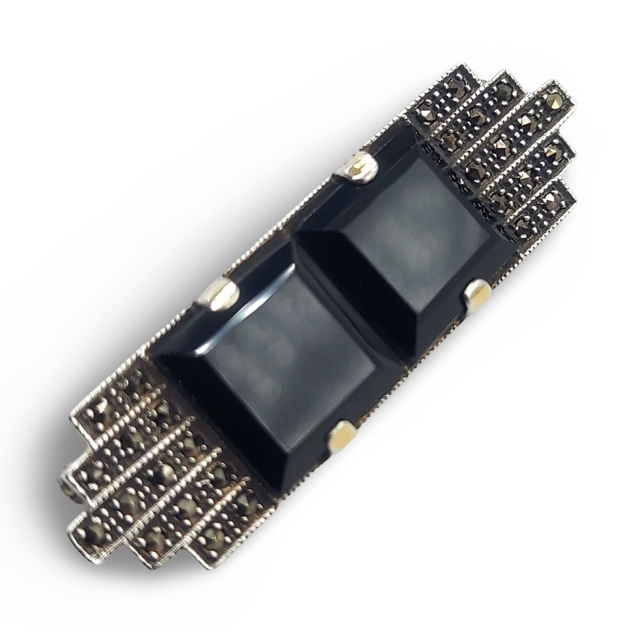 Back view of Fine Bead Set Art Deco Style Marcasite Onyx Pin or Brooch showing 925 sterling silver hallmark and pin back