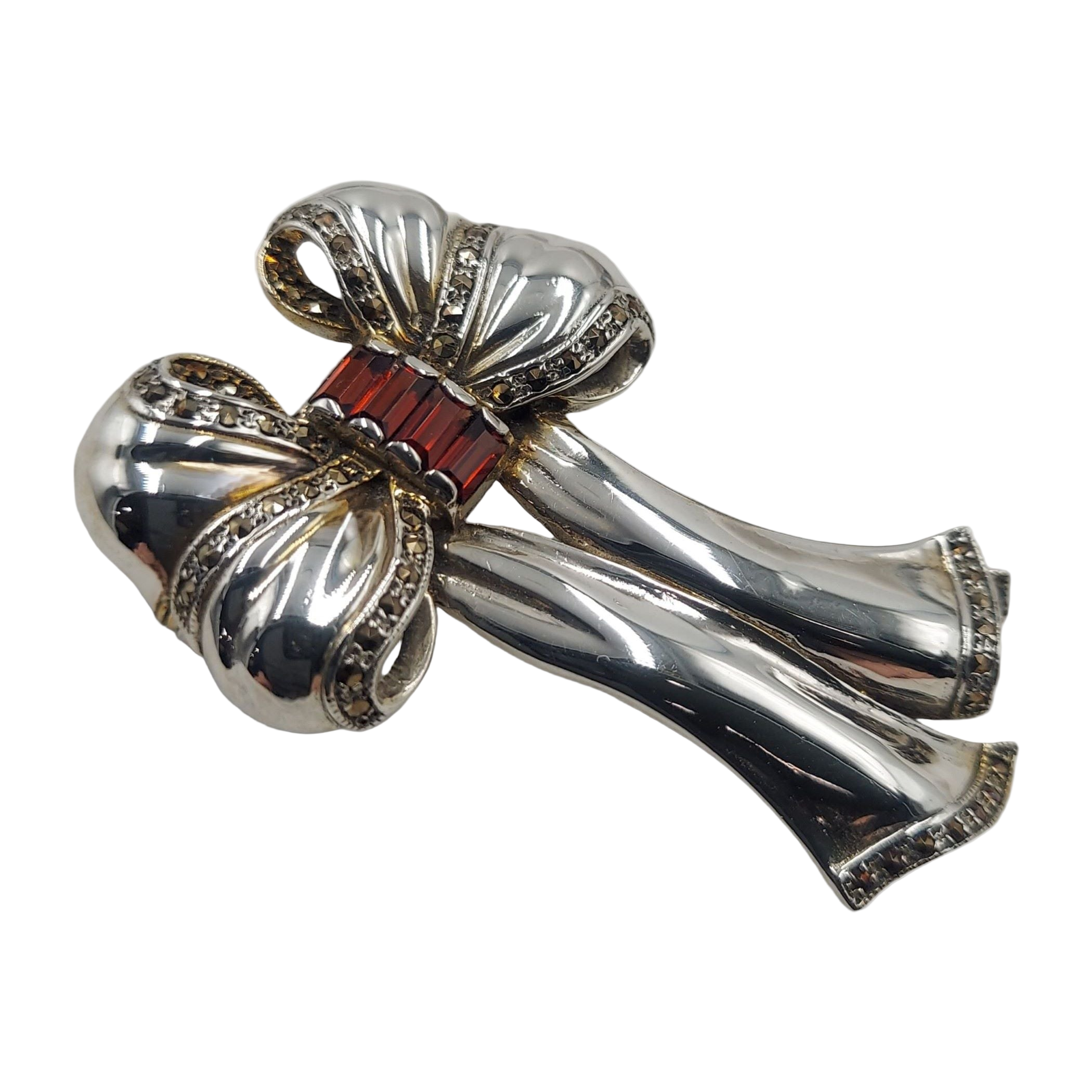 Back view of Fine Bead Set Marcasite Bow Pin or Brooch with Garnets showing 925 sterling silver hallmark and pin back